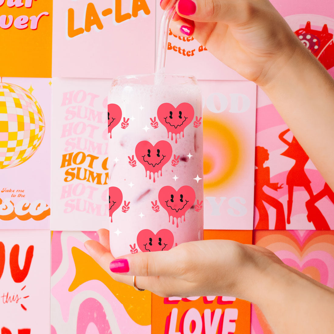 20oz glass cup that says "Badass Bougie Bitch" for bold women.
Retro clip 20oz glass cup with red smiley face candy hearts.
Peace sign candy heart design on a 20oz glass cup for Galentineās Day.