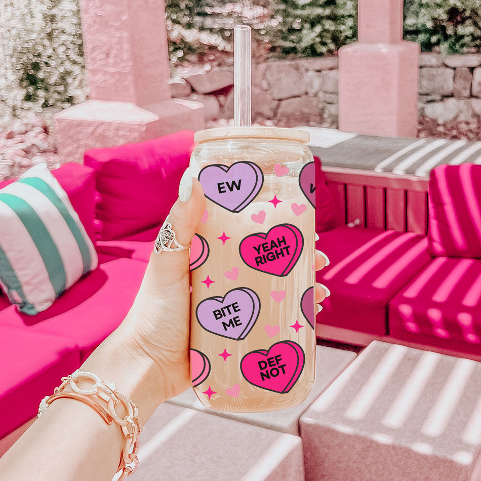 Cute and funny Valentine’s Day glass tumblers for her.
Playful Valentine’s drinkware featuring candy hearts.