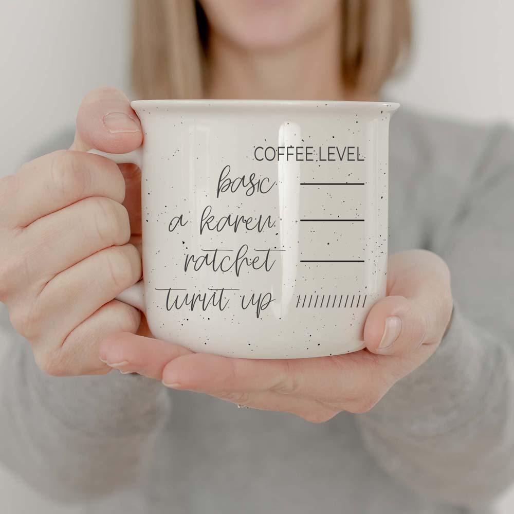 White ceramic mug with coffee attitude meter design