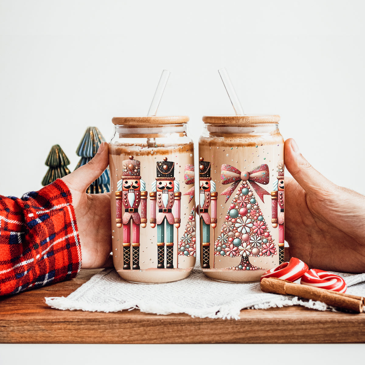 Sparkly Christmas coffee mug ā glass cup with pink, teal, gold accents and glitter
Festive holiday coffee cup ā boho Nutcracker soldiers with Christmas tree wrap
