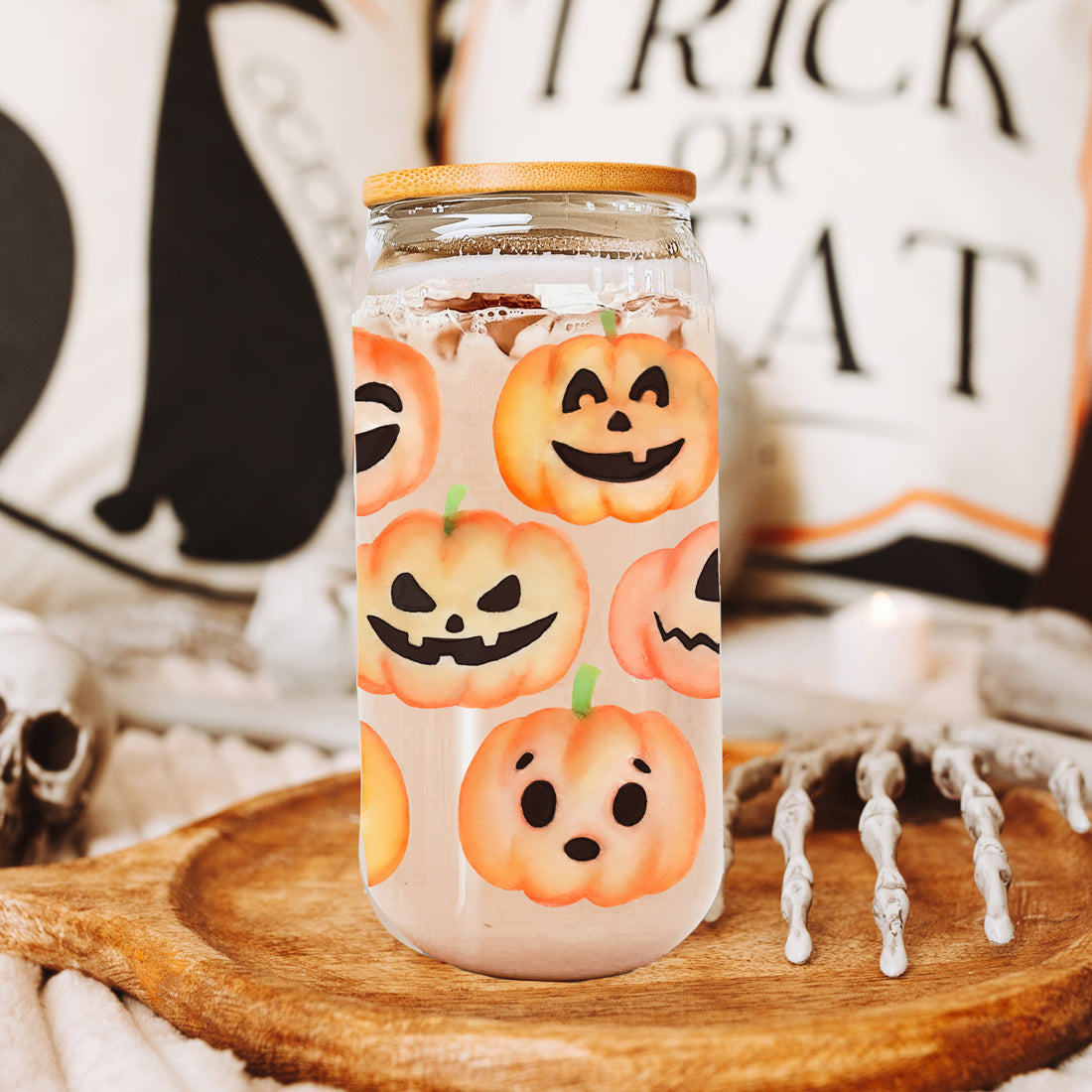 Halloween themed glass drinking cup with jack o lantern designs
Cute fall pumpkin tumbler with reusable straw and wooden lid