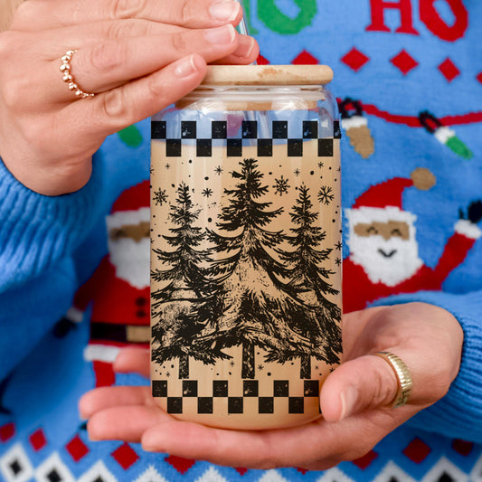 Christmas retro drinkware - festive tumbler cup for holiday entertaining
Vintage Christmas glass with retro tree artwork - 17oz tumbler gift
Buffalo plaid and tree Christmas tumbler - farmhouse holiday drinkware